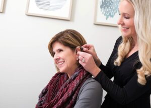 Audiologist with Patient